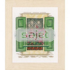 stickpackung raam met groene luiken