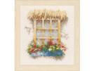 stickpackung raam met bloemenhaag