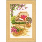 stickpackung rieten stoel in bloementuin