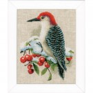 stickpackung rode specht in wintersfeer